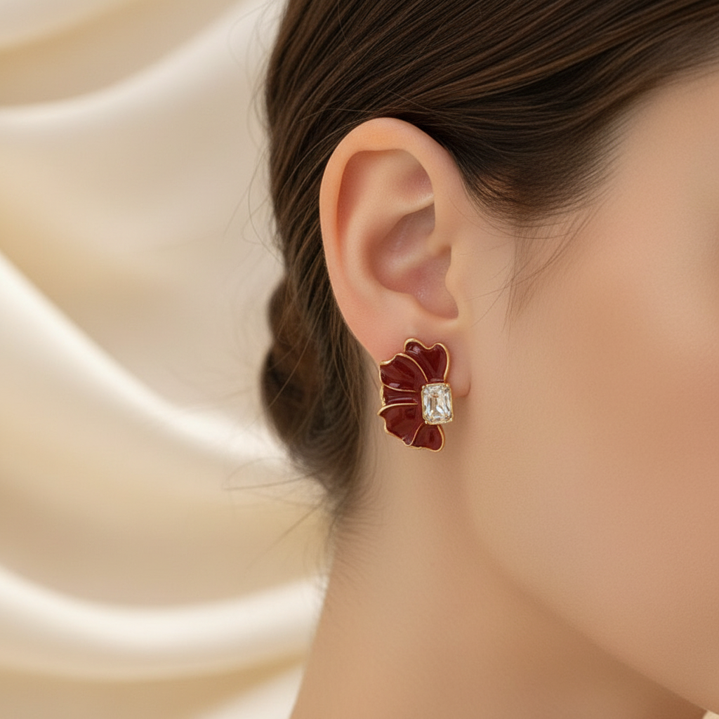 Rouge Petal Earrings – worn on model's ear