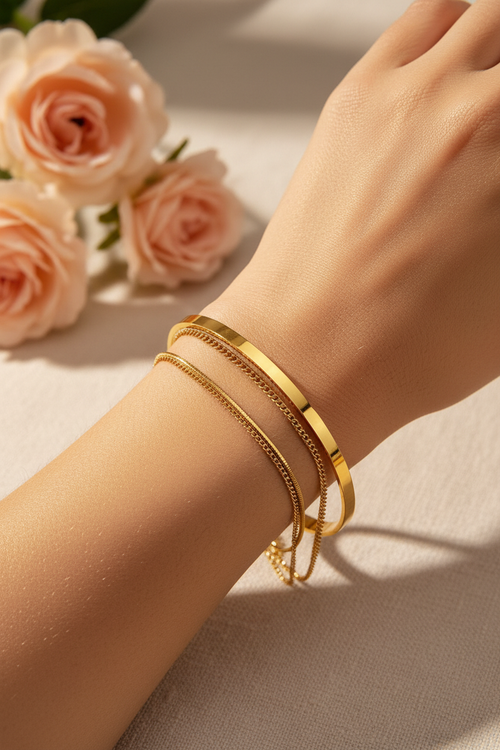 Gold bracelet set worn on wrist lifestyle shot