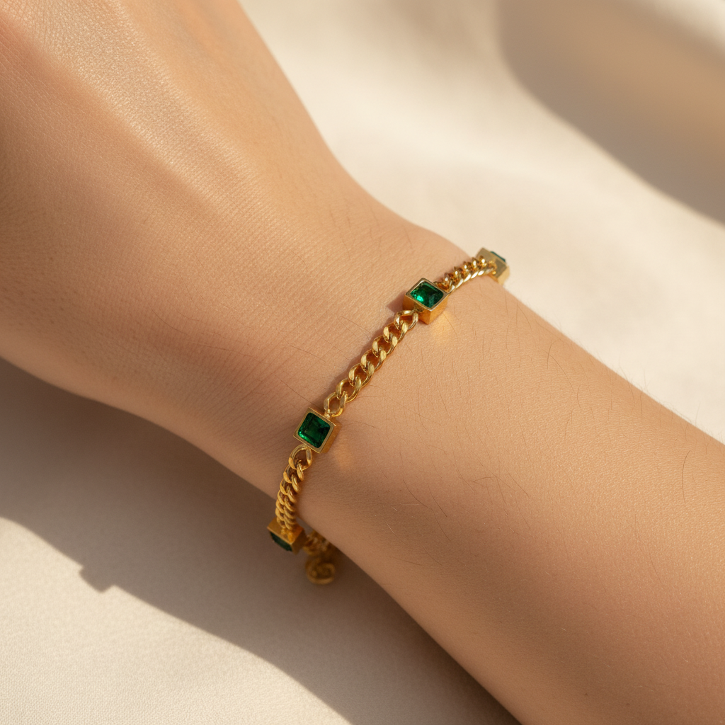 Emerald green stone gold bracelet worn on wrist lifestyle