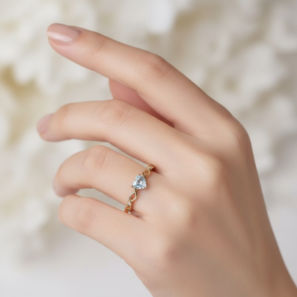 Aqua Heart Infinity Ring – worn on model's hand