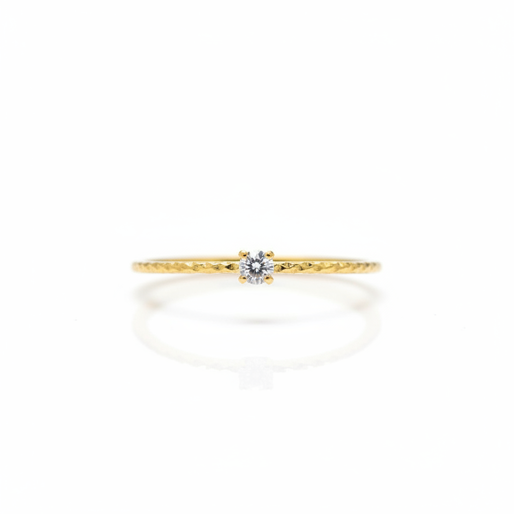 Dainty Gold Solitaire Crystal Ring on white background