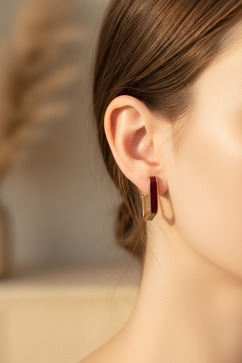 Burgundy Enamel Gold Geometric Stud Earrings worn on model